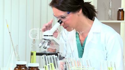 Research Assistant Using Microscope