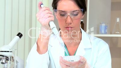 Female Medical Researcher in Laboratory