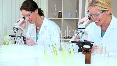 Female Medical Researchers in Lab