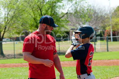 Baseball coach and teen player