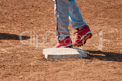 Baseball teen on base