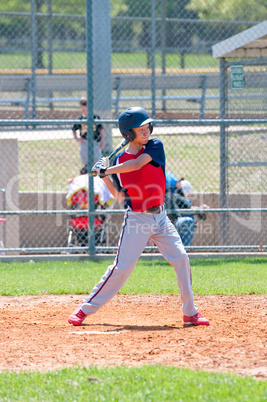 Teen baseball batter