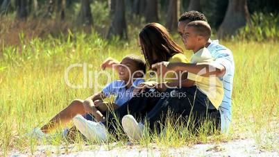 African American Family Enjoying Time Outdoors