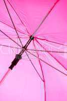 Open Pink Umbrella Apparatus Closeup