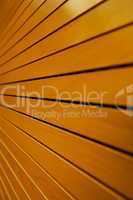 Rows of Golden Tightly Fitted Wooden Slats Closeup