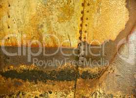 Rusted Metal Background with Rivet Holes and Seams