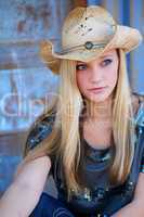 Teen Blond Model with Cowboy Hat and Blue Eyes