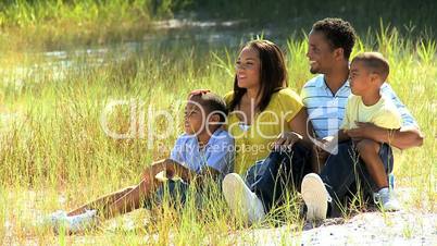 Young Ethnic Family Enjoying the Park