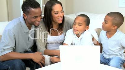 Young Family Talking Via Online Web Chat