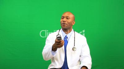 Male Ethnic Doctor Remote Green Screen Technology