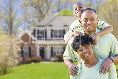 African American Family In Front of Beautiful House