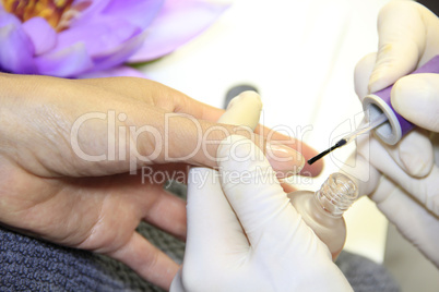 Female Hand - in manicure treatment - before