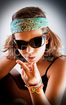 Young girl making peace sign