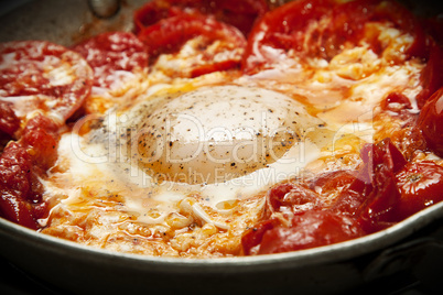 Fried egg with tomato