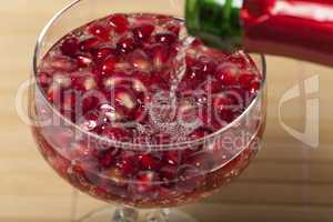 Granatapfelkerne im Sektglas
