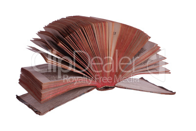 old historic book with fanned pages on white