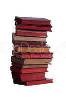 stack of very old books with red pages