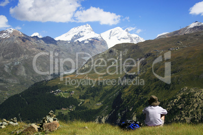 Traveler sittings in mountains