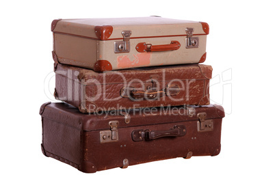 stack of aged suitcases