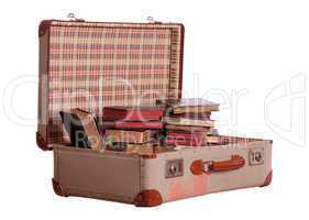 old suitcase stuffed with old books