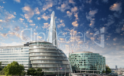 New London city hall with Thames river and cloudy sky, panoramic