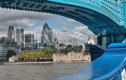 London Modern Buildings framed by Tower Bridge metal structure