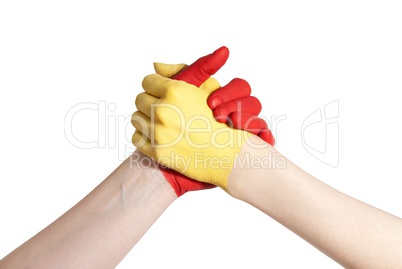 yellow and red hand in competition