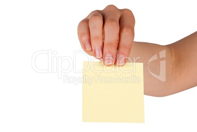 hand holding a label with copy space