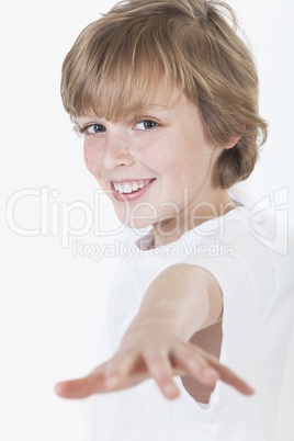 Young Happy Blond Boy Reaching and Smiling