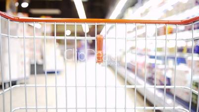 Shopping Cart - moving slowly in the market - orange