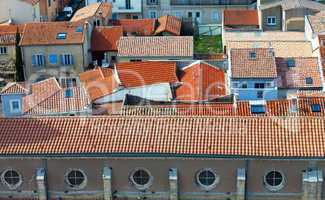 Top view on red tiled roofs