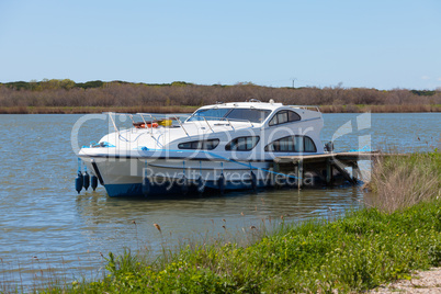 Luxury pleasure boat moored at the pier