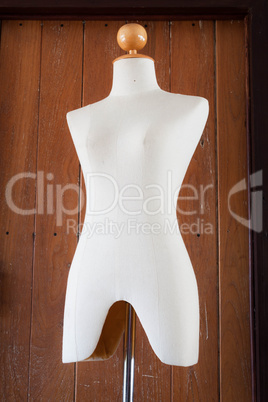 sepia clothing mannequin display on  vintage background
