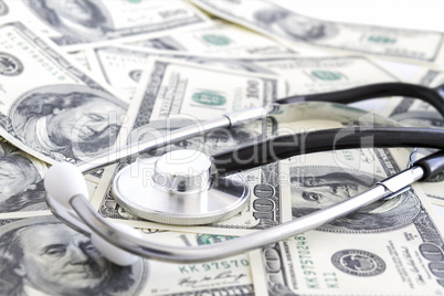 Money and stethoscope, medical insurance
