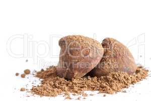 Chocolate truffles on cocoa powder
