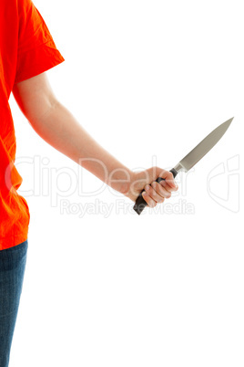 Die junge Frau hält ein Messer in der Hand