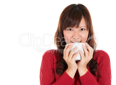 Asian woman drinking coffee or tea