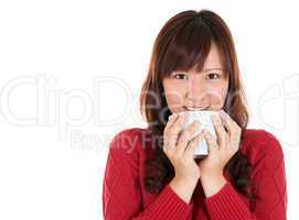 Asian woman drinking coffee or tea