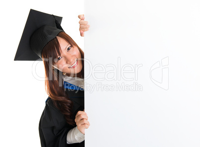 Graduate student hiding behind blank placard