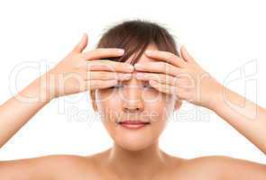 Skincare woman putting eye cream
