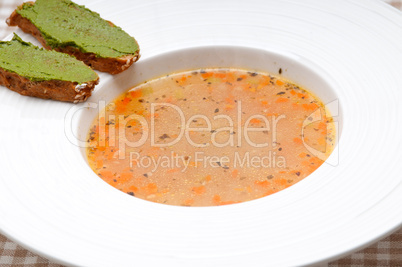 Italian minestrone soup with pesto crostini on side