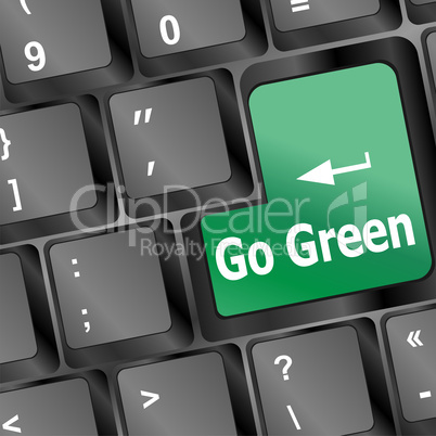 A keyboard with a key reading Go Green