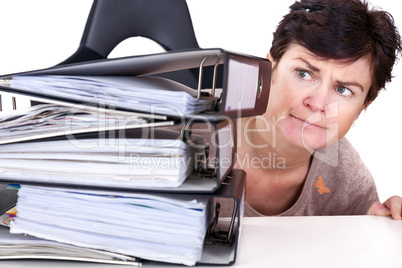 Woman looking at folders on the desk
