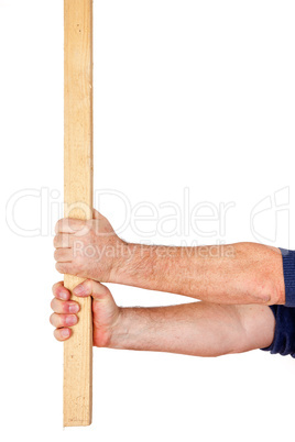 Hand holding wooden slat