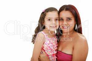 Young latin mother hugging her daughter isolated on a white back