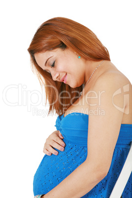 young pregnant woman holding her hands on her tummy young pregnant woman holding her hands on her tummy