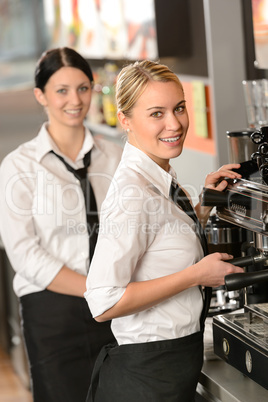 Smiling young waitresses serving coffee restaurant