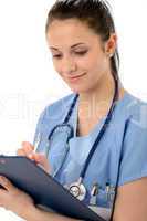Smiling woman doctor writing on clipboard