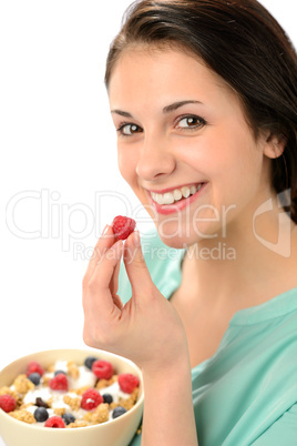 Happy woman with a bowl of cereal