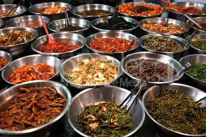 Bowls of kimchi on a Korean traditonal food market